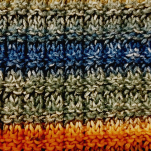 “Le point de gaufre: un motif de tricot texturé qui ajoute une touche de sophistication et de confort à vos projets”